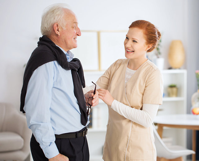 senior man with his caregiver