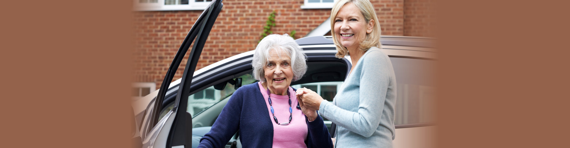 young woman assisting senior woman